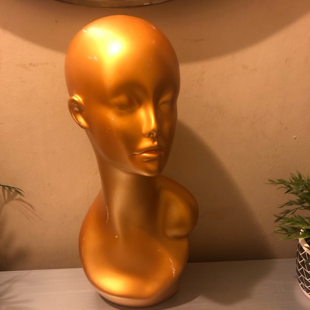 Gold mannequin head